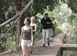 Naughty lesbians eat each other outdoor wooded area